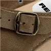 Close-up of a buckle and strap on a shoe. Produktbild-Vorschau