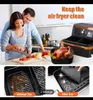 A couple preparing food in a kitchen with an air fryer and accessories. Produktbild-Vorschau