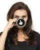 A woman holds a mug with a middle finger graphic to her face. Náhled obrázku produktu