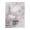 A rectangular rug with an abstract, distressed pattern in shades of gray, white, and black. Produktbild-Vorschau
