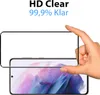 A hand is holding a screen protector over a smartphone. Produktbild-Vorschau