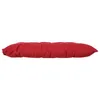 A red cushion viewed from the side against a white background. Anteprima dell’immagine prodotto