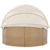 A round outdoor sofa with a beige canopy. Voir les images du produit