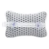 A white bath pillow with a gray dot pattern and two blue suction cups is shown against a white background. Anteprima dell’immagine prodotto