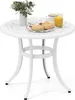 A white round side table with a decorative top, set with a vase of flowers, a mug, and two pastries. Podgląd zdjęcia produktu