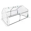A white plastic greenhouse with a green frame, shown from a slightly elevated side angle against a white background. Voir les images du produit