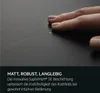 A hand touching a black induction cooktop with faint white lines indicating cooking zones. Anteprima dell’immagine prodotto