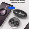 A smartphone displaying a music app is shown next to a pair of wireless earbuds in their charging case and on a charging stand. Produktbild-Vorschau
