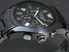 Close-up of a black Emporio Armani watch. Produktbild-Vorschau