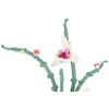 A close-up of a toy orchid flower model made of building blocks, with green stems and white and pink flowers. Náhľad obrázku produktu