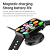 A smartwatch is shown magnetically charging on its charging puck, with text highlighting its features. Náhled obrázku produktu