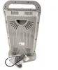The back of a gray electric heater is shown against a white background. A power cord is visible in the lower left corner. Náhled obrázku produktu