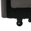 A close-up view of the bottom of a dark gray sofa, showing a black caster wheel attached to the frame. Produktbild-Vorschau