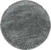 A round, gray, shaggy rug.