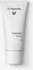 A white tube of Dr. Hauschka foundation. Voir les images du produit