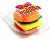 A gummy candy shaped like a hamburger, presented in clear plastic packaging. Produktbild-Vorschau