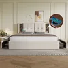 A bedroom scene with a bed and nightstands, featuring a close-up inset of a phone charging wirelessly. Náhled obrázku produktu