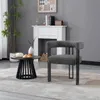 A modern living room scene with a chair and coffee table. Produktbild-Vorschau