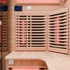 Interior view of a wooden infrared sauna with heating elements visible. Produktbild-Vorschau