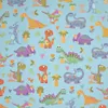 Geschenkpapier kleine Dinosaurier 70cm x 2m Rolle hellblau Produktbild-Vorschau 1