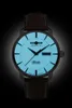 A close-up studio shot of a men's wristwatch against a black background. Náhľad obrázku produktu