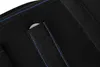 A close-up view of a black fabric belt with blue stitching and a small gray button. Náhľad obrázku produktu
