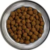 A top-down view of a metal bowl filled with brown kibble. Produktbild-Vorschau