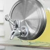 Close-up of a beverage dispenser tap and lid, likely in a refrigerator. Produktbild-Vorschau