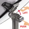 Close-up of a table leg mechanism with instructions on how to operate it. Voir les images du produit
