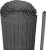 A rolled-up dark gray PVC privacy screen and a single stake.