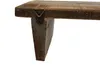 A close-up view of the corner of a wooden shelf, showing its construction and mounting bracket. Produktbild-Vorschau
