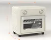 A cream-colored mini oven with dimensions indicated by orange lines and text. Produktbild-Vorschau