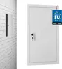 A white metal revision door with a key lock is shown. To the left, a similar door is installed in a white brick wall. Produktbild-Vorschau