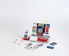 A toy cash register and payment terminal with play money and coins are arranged on a white background. Produktbild-Vorschau