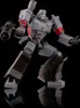 A toy robot figure, Megatron from Transformers G1, posed against a black background. Podgląd zdjęcia produktu