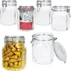 A collection of glass jars with clamp lids, some filled with yellow peppers and one with a label indicating '100% Made in Italy'. Náhled obrázku produktu