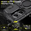 A close-up of a black phone case with a ring stand and camera cover, shown in a dynamic scene with falling debris and highlighted protective features. Produktbild-Vorschau