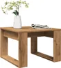 A wooden side table with a vase of flowers and a magazine on top. Podgląd zdjęcia produktu