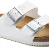 A close-up view of a pair of white Birkenstock sandals. Náhľad obrázku produktu
