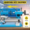 A close-up view of a blue metal lathe with yellow text overlays and icons. Produktbild-Vorschau