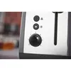 A close-up view of the control panel of a toaster. Voir les images du produit