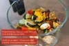 Der Korb der Unold Heißluftfritteuse Glas ist mit gehackten Zucchini, Paprika und Champignons gefüll Produktbild-Vorschau