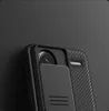 A close-up view of the back of a black smartphone case with a sliding camera cover. Podgląd zdjęcia produktu