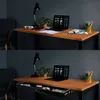 A desk setup with a laptop, lamp, plant, and a sliding drawer with office supplies. Podgląd zdjęcia produktu
