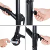 Collage of four close-up shots demonstrating how to assemble and adjust parts of a black umbrella stand. Voir les images du produit