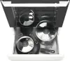 A top-down view of an open kitchen drawer filled with pots and pans. Produktbild-Vorschau