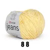 A ball of yellow yarn with a label. Náhľad obrázku produktu