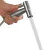 A hand holding a bidet sprayer with water spraying from it. Anteprima dell’immagine prodotto
