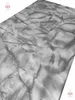 A close-up, angled view of a marble-patterned surface, likely a panel or material. Náhled obrázku produktu