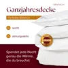 A stack of white duvets with marketing text and icons. Voir les images du produit